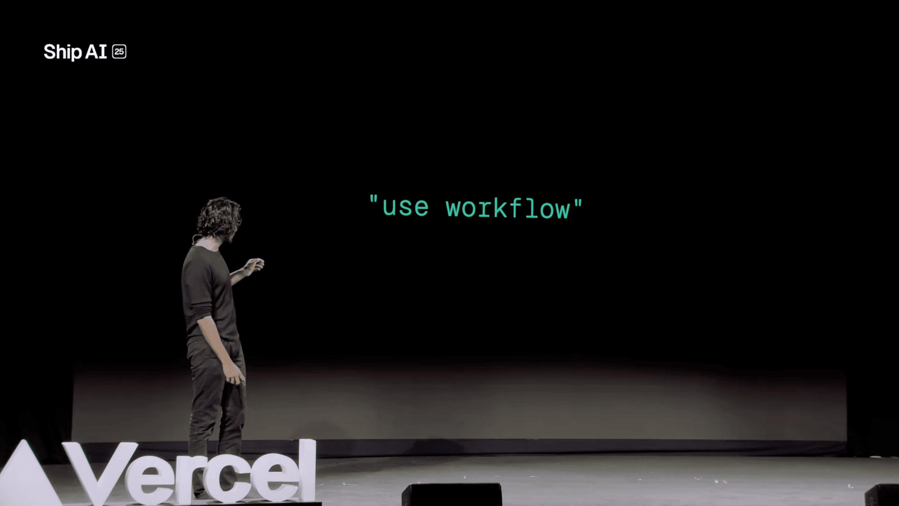 Pranay Prakash, Tech Lead at Vercel, in front of a keynote slide showing the 'use workflow' directive. Screenshot from YouTube.